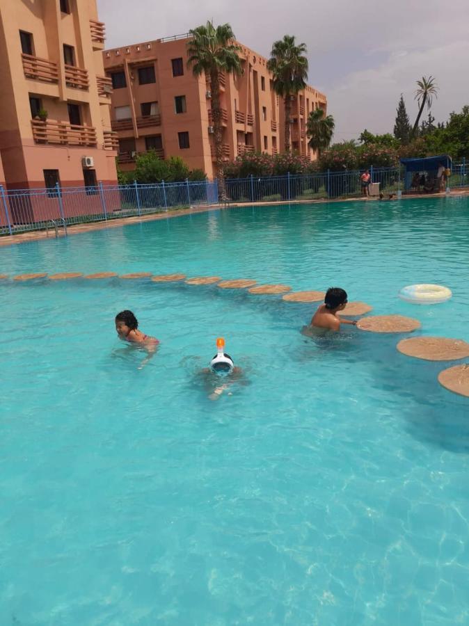 Appartement Charmant logement avec parking résidenciel sans piscines à Marrakesh Extérieur photo