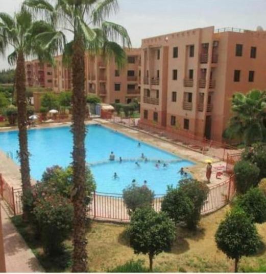 Appartement Charmant logement avec parking résidenciel sans piscines à Marrakesh Extérieur photo
