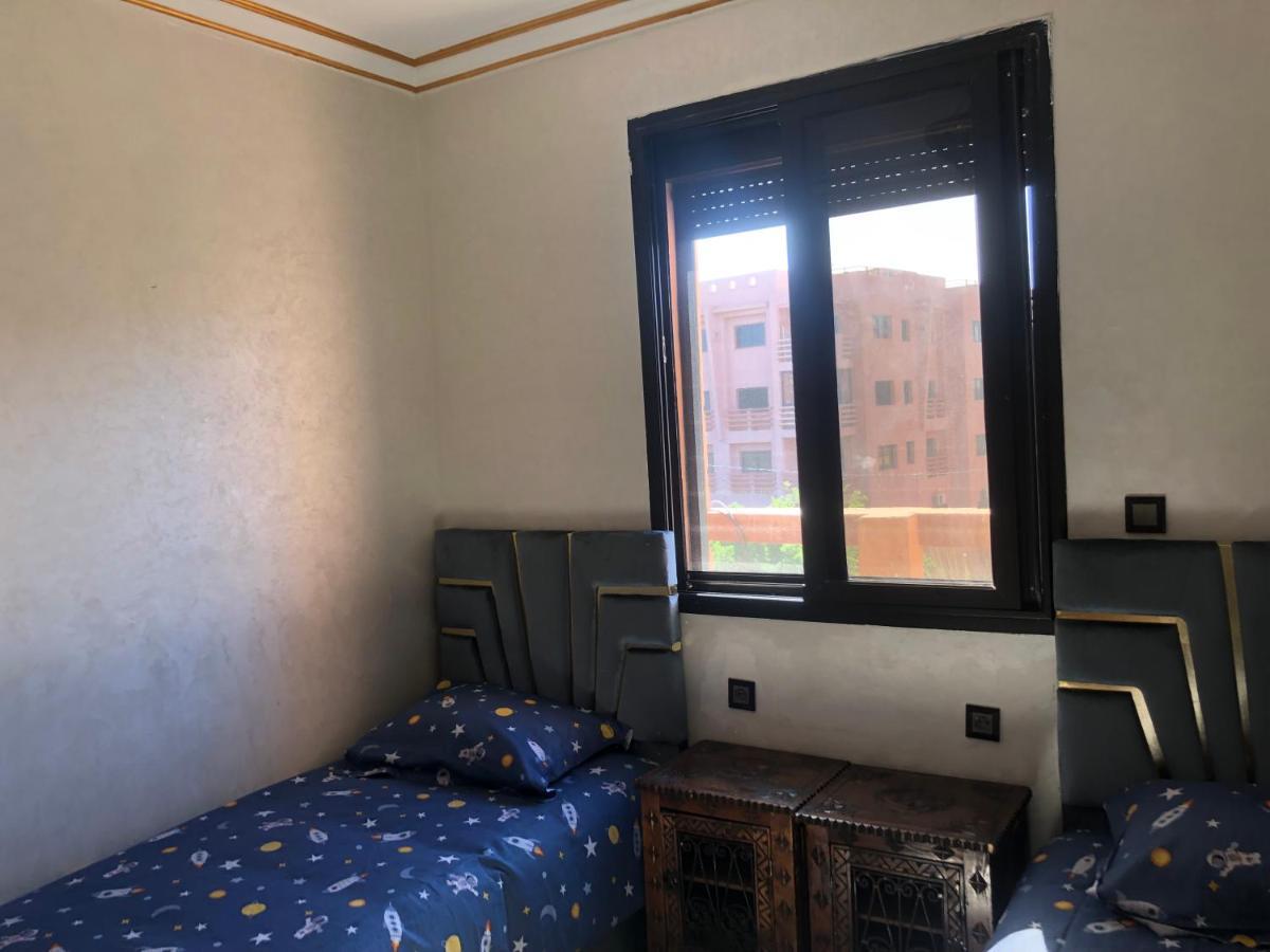 Appartement Charmant logement avec parking résidenciel sans piscines à Marrakesh Extérieur photo